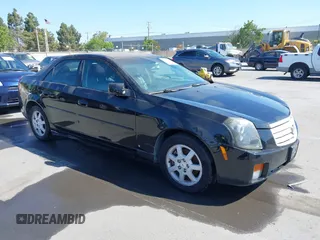 2007 Cadillac CTS with VIN 1G6DM57T770165558, listed as a IAAI auction lot 42146188 with 236,763 mi miles. Bid and sale history available at carsss.com. Image 1.