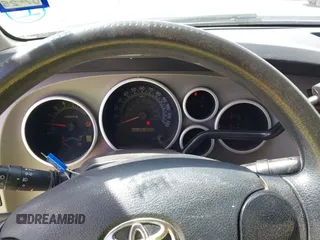2013 Toyota Tundra z VIN 5TFRM5F19DX063197, wystawiony jako IAAI lot #41799886 z przebiegiem 351 859 mil mil oraz . Historia ofert i sprzedaży dostępna na DreamBid. Obrazek 7.