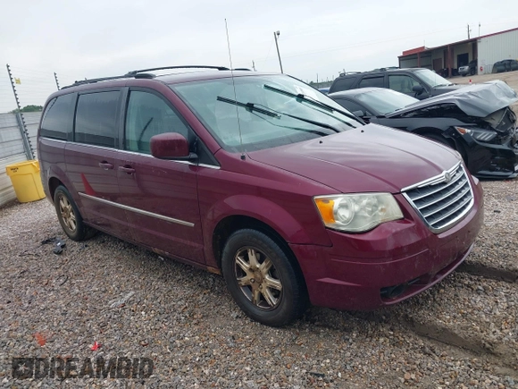 2009 Chrysler Town & Country Touring with VIN 2A8HR54169R618640, listed as a IAAI auction lot 42210905 with 227,420 mi miles and . Bid and sale history available at DreamBid. Image 1.