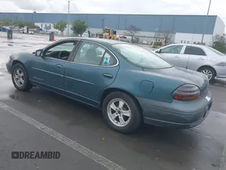 1997 Pontiac Grand Prix SE with VIN 1G2WJ52K0VF249961, listed as a IAAI auction lot 41512770 with 168,408 mi miles. Bid and sale history available at carsss.com. Image 3.