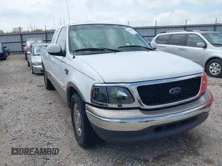 2003 Ford F-150 XL with VIN 1FTRX17L33NB79733, listed as a IAAI auction lot 42023385 with 136,236 mi miles. Bid and sale history available at carsss.com. Image 1.