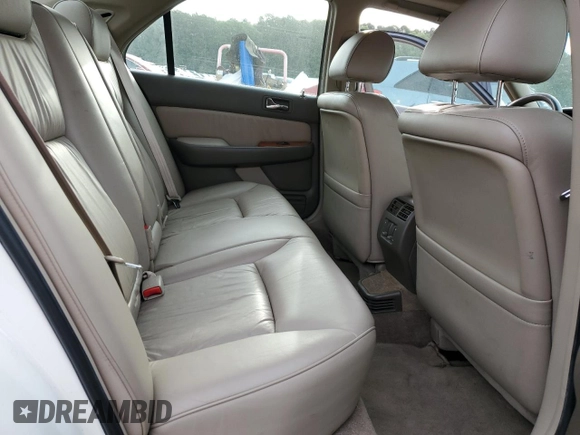 2004 Acura RL w/Navigation System z VIN JH4KA96674C007925, wystawiony jako Copart lot #56732645 z przebiegiem 188 312 mil mil oraz Szkoda całkowita • Salvage title. Historia ofert i sprzedaży dostępna na DreamBid. Obrazek 10.