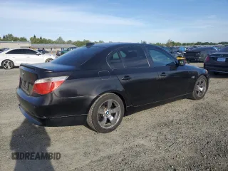 2005 BMW 5 Series 545i with VIN WBANB33565CN65980, listed as a Copart auction lot 52961975 with 143,772 mi miles and Salvage Title. Bid and sale history available at carsss.com. Image 3.