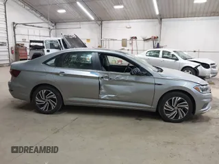 2021 Volkswagen Jetta SEL with VIN 3VWE57BUXMM056379, listed as a IAAI auction lot 42456450 with 34,697 mi miles and . Bid and sale history available at DreamBid. Image 12.