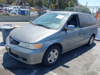 1999 Honda Odyssey EX z VIN 2HKRL1861XH549362, wystawiony jako IAAI lot #42400965 z przebiegiem 193 403 mil mil oraz . Historia ofert i sprzedaży dostępna na DreamBid. Obrazek 2.
