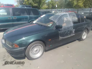 2000 BMW 5 Series 528i z VIN WBADM6347YGU09362, wystawiony jako IAAI lot #31257286 z przebiegiem Nie podano mil oraz . Historia ofert i sprzedaży dostępna na DreamBid. Obrazek 2.