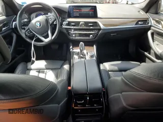 2019 BMW 5 Series 530i xDrive z VIN WBAJA7C50KG911728, wystawiony jako Copart lot #58306955 z przebiegiem 64 924 mil mil oraz Szkoda całkowita • Salvage title. Historia ofert i sprzedaży dostępna na DreamBid. Obrazek 8.