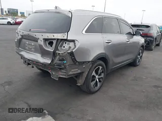 2018 Kia Sorento EX with VIN 5XYPH4A59JG394960, listed as a IAAI auction lot 42342621 with 158,056 mi miles and . Bid and sale history available at DreamBid. Image 4.