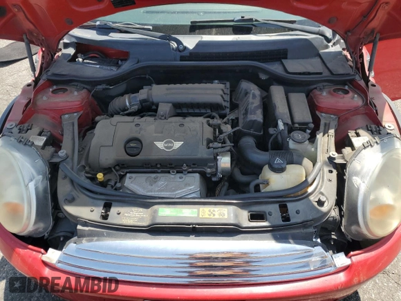 2010 MINI Convertible с VIN WMWMR3C59ATU97966, выставлен на аукционе Copart как лот 59870035 с пробегом 124 132 миль миль и Списание • Salvage title. История ставок и продаж доступна на DreamBid. Изображение 11.