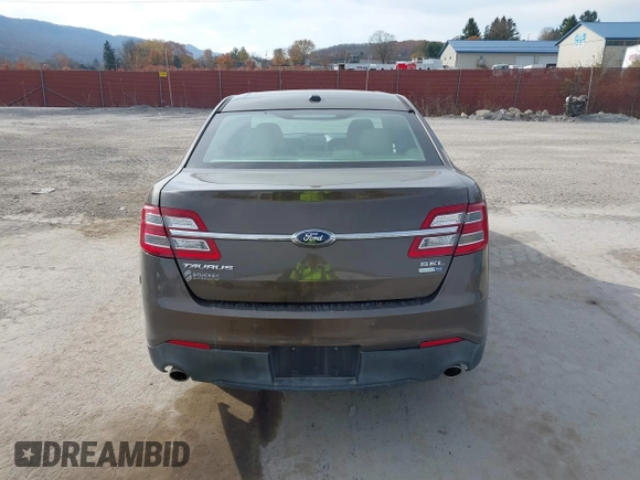 2015 Ford Taurus SEL with VIN 1FAHP2H87FG199865, listed as a IAAI auction lot 40760225 with 77,782 mi miles. Bid and sale history available at carsss.com. Image 16.
