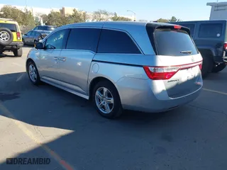 2011 Honda Odyssey Touring with VIN 5FNRL5H9XBB012899, listed as a IAAI auction lot 41611879 with 171,041 mi miles. Bid and sale history available at carsss.com. Image 3.