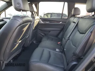 2023 Cadillac XT6 FWD Premium Luxury z VIN 1GYKPCRS6PZ127331, wystawiony jako Copart lot #88802755 z przebiegiem 47 796 mil mil oraz Szkoda całkowita • Salvage title. Historia ofert i sprzedaży dostępna na DreamBid. Obrazek 10.