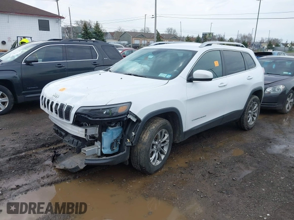 2020 Jeep Cherokee Altitude with VIN 1C4PJMLXXLD635994, listed as a IAAI auction lot 42074726 with 25,766 mi miles and . Bid and sale history available at DreamBid. Image 2.