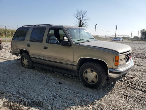 1999 GMC Yukon with VIN 1GKEK13R5XJ725991, listed as a Copart auction lot 71176784 with 245,481 mi miles and Clean Title. Bid and sale history available at carsss.com. Image 4.