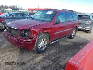 2008 GMC Envoy SLE2 with VIN 1GKDT13S682120370, listed as a IAAI auction lot 41653263 with 214,739 mi miles. Bid and sale history available at carsss.com. Image 2.