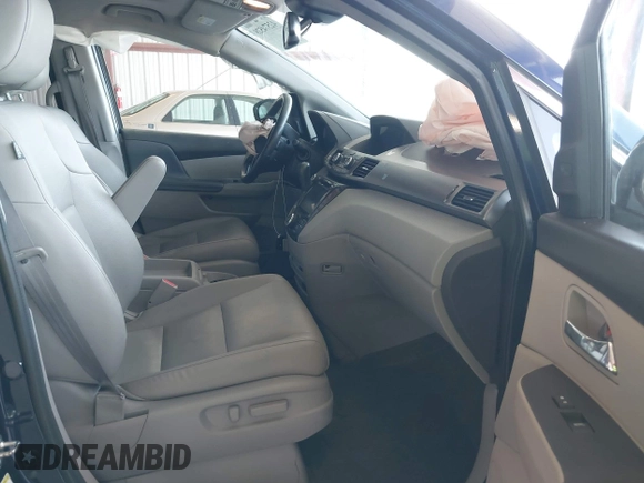 2017 Honda Odyssey Touring with VIN 5FNRL5H90HB017215, listed as a IAAI auction lot 42574528 with 61,386 mi miles and . Bid and sale history available at DreamBid. Image 5.
