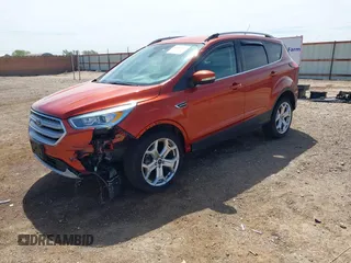 2019 Ford Escape Titanium with VIN 1FMCU9J92KUB28895, listed as a IAAI auction lot 42065235 with 112,305 mi miles and . Bid and sale history available at DreamBid. Image 2.