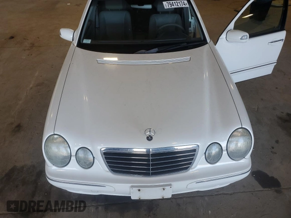 2000 Mercedes-Benz E-Class AWD with VIN WDBJF82J1YX029676, listed as a Copart auction lot 79412174 with 96,324 mi miles and Clean Title. Bid and sale history available at carsss.com. Image 11.