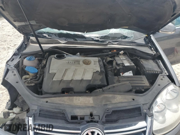 2010 Volkswagen Jetta TDI z VIN 3VWRL7AJ2AM148600, wystawiony jako Copart lot #51694565 z przebiegiem 342 094 mil mil oraz Szkoda całkowita • Salvage title. Historia ofert i sprzedaży dostępna na DreamBid. Obrazek 11.