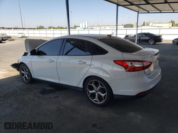 2012 Ford Focus SE with VIN 1FAHP3F20CL468537, listed as a Copart auction lot 64408615 with 173,753 mi miles and Salvage title. Bid and sale history available at DreamBid. Image 2.