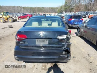 2016 Volkswagen Jetta SEL z VIN 3VWL07AJ5GM212572, wystawiony jako IAAI lot #41470003 z przebiegiem 138 988 mil mil oraz . Historia ofert i sprzedaży dostępna na DreamBid. Obrazek 16.