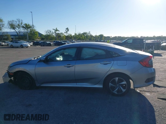 2020 Honda Civic LX with VIN 19XFC2F63LE004953, listed as a IAAI auction lot 41824922 with 71,458 mi miles and . Bid and sale history available at DreamBid. Image 14.