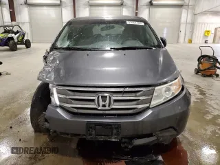 2012 Honda Odyssey Touring with VIN 5FNRL5H98CB028309, listed as a Copart auction lot 57663485 with 233,921 mi miles and Salvage title. Bid and sale history available at DreamBid. Image 5.