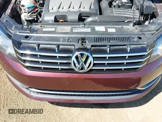 2012 Volkswagen Passat SE z VIN 1VWBN7A3XCC097252, wystawiony jako IAAI lot #42373075 z przebiegiem 134 733 mil mil oraz . Historia ofert i sprzedaży dostępna na DreamBid. Obrazek 6.
