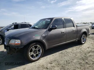 2002 Ford F-150 Harley Davidson with VIN 1FTRW07342KC78218, listed as a Copart auction lot 78273304 with 217,968 mi miles and Salvage Title. Bid and sale history available at carsss.com. Image 1.