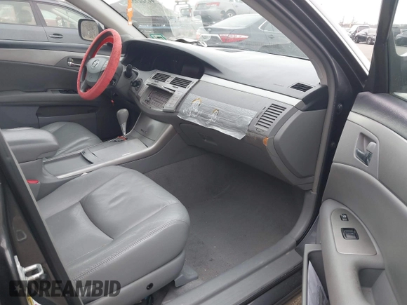 2009 Toyota Avalon XL with VIN 4T1BK36B59U350786, listed as a IAAI auction lot 41322151 with 222,128 mi miles. Bid and sale history available at carsss.com. Image 5.