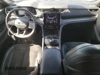 2023 Jeep Grand Cherokee Altitude with VIN 1C4RJGAG4PC551629, listed as a Copart auction lot 77394954 with 53,338 mi miles and Salvage title. Bid and sale history available at DreamBid. Image 8.