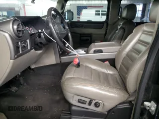 2003 Hummer H2 with VIN 5GRGN23U73H116472, listed as a Copart auction lot 86919214 with 172,543 mi miles and Salvage Title. Bid and sale history available at carsss.com. Image 7.