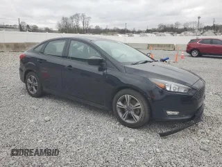 2018 Ford Focus SE with VIN 1FADP3FE0JL318465, listed as a Copart auction lot 51136615 with 82,191 mi miles and Salvage Title. Bid and sale history available at carsss.com. Image 4.