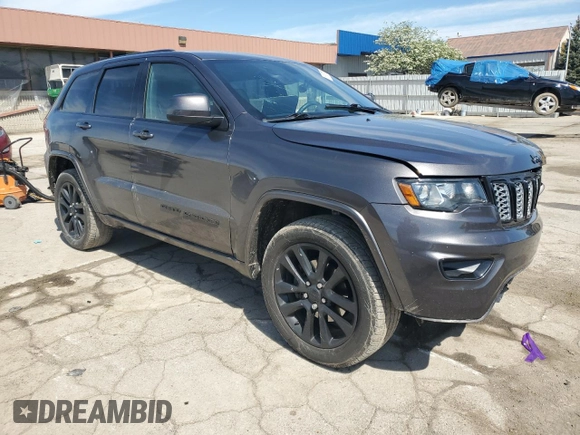 2017 Jeep Grand Cherokee Altitude with VIN 1C4RJFAG8HC873444, listed as a Copart auction lot 56136075 with 123,653 mi miles and Clean title. Bid and sale history available at DreamBid. Image 4.