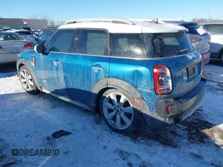 2018 MINI Countryman Cooper S with VIN WMZYT5C3XJ3E61612, listed as a IAAI auction lot 41276107 with 59,554 mi miles and . Bid and sale history available at DreamBid. Image 3.