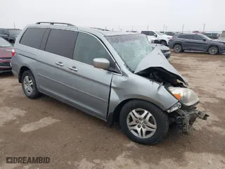 2005 Honda Odyssey EX-L with VIN 5FNRL38755B092104, listed as a IAAI auction lot 41567629 with 1 mi miles. Bid and sale history available at carsss.com. Image 1.