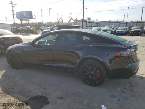 2021 Tesla Model S Plaid with VIN 5YJSA1E69MF438211, listed as a Copart auction lot 79697604 with 58,350 mi miles and Salvage Title. Bid and sale history available at carsss.com. Image 2.