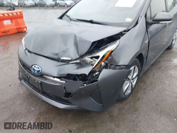 2017 Toyota Prius Two with VIN JTDKBRFU2H3050409, listed as a IAAI auction lot 41876149 with 43,849 mi miles and . Bid and sale history available at DreamBid. Image 6.