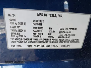 2024 Tesla Model Y Long Range with VIN 7SAYGDEE2RF129577, listed as a IAAI auction lot 41357180 with 6,697 mi miles and . Bid and sale history available at DreamBid. Image 9.