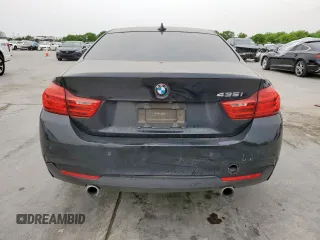2015 BMW 4 Series 435i with VIN WBA3R1C59FK193405, listed as a Copart auction lot 52563835 with 86,820 mi miles and Salvage title. Bid and sale history available at DreamBid. Image 6.