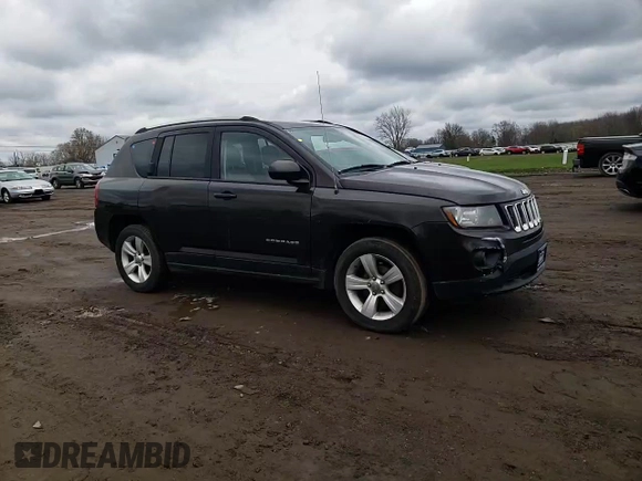 2014 Jeep Compass Sport with VIN 1C4NJDBB9ED670610, listed as a Copart auction lot 52691825 with 150,525 mi miles and Salvage Title. Bid and sale history available at carsss.com. Image 12.