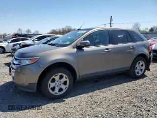 2014 Ford Edge SEL z VIN 2FMDK4JC7EBA36345, wystawiony jako Copart lot #53434145 z przebiegiem 184 955 mil mil oraz Szkody całkowita. Historia ofert i sprzedaży dostępna na DreamBid. Obrazek 1.
