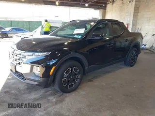 2022 Hyundai Santa Cruz SEL z VIN 5NTJCDAE7NH018858, wystawiony jako IAAI lot #42038182 z przebiegiem 28 596 mil mil oraz . Historia ofert i sprzedaży dostępna na DreamBid. Obrazek 2.