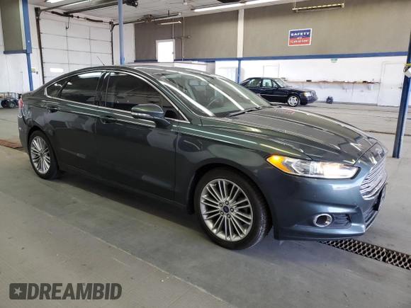 2015 Ford Fusion SE z VIN 3FA6P0H98FR295646, wystawiony jako Copart lot #57055105 z przebiegiem 121 515 mil mil oraz Szkoda całkowita • Salvage title. Historia ofert i sprzedaży dostępna na DreamBid. Obrazek 4.