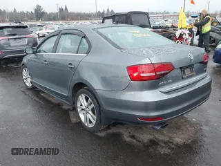 2017 Volkswagen Jetta SEL with VIN 3VWL17AJ1HM211546, listed as a IAAI auction lot 41502402 with 52,030 mi miles and . Bid and sale history available at DreamBid. Image 3.