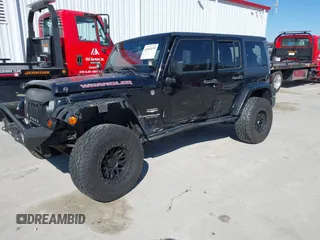 2013 Jeep Wrangler Unlimited Sahara with VIN 1C4BJWEG3DL617511, listed as a IAAI auction lot 41842979 with 149,980 mi miles and . Bid and sale history available at DreamBid. Image 17.