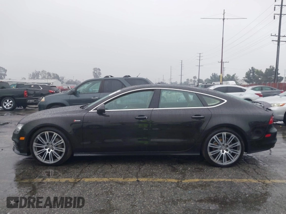 2014 Audi A7 3.0 Prestige with VIN WAU2GAFC5EN090233, listed as a IAAI auction lot 41565942 with 199,890 mi miles. Bid and sale history available at carsss.com. Image 15.