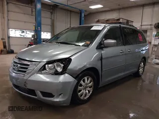 2008 Honda Odyssey EX-L with VIN 5FNRL38738B030818, listed as a IAAI auction lot 41718717 with 247,994 mi miles and . Bid and sale history available at DreamBid. Image 2.