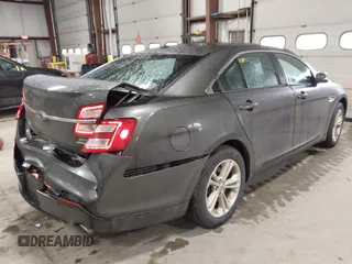2015 Ford Taurus SEL with VIN 1FAHP2E87FG207029, listed as a IAAI auction lot 41752890 with 119,858 mi miles and . Bid and sale history available at carsss.com. Image 4.