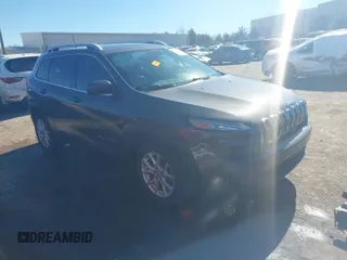 2018 Jeep Cherokee Latitude Plus with VIN 1C4PJLLB8JD597029, listed as a IAAI auction lot 41474803 with 84,435 mi miles. Bid and sale history available at carsss.com. Image 1.